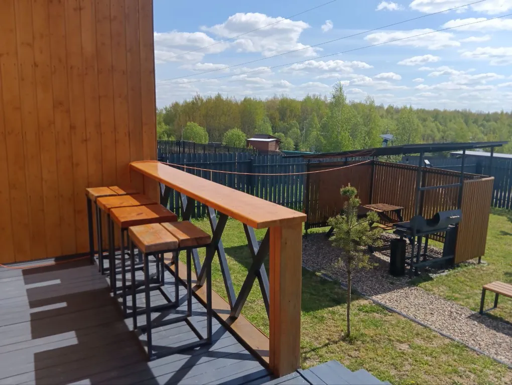 Коттедж с сауной для семейного отдыха в стиле барнхаус