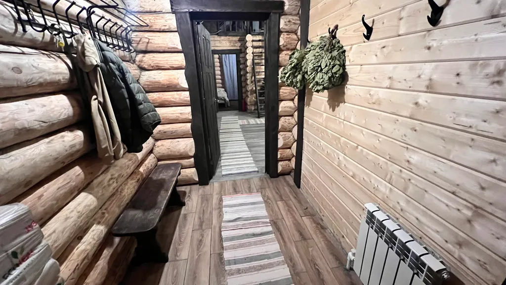 Рубленный дом - баня с террасой