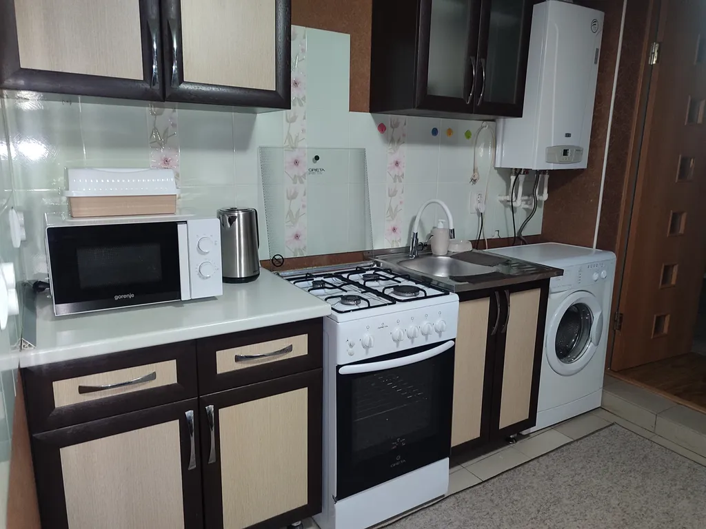 Уютный домик с отдельным двором и мангальной зоной в центре города