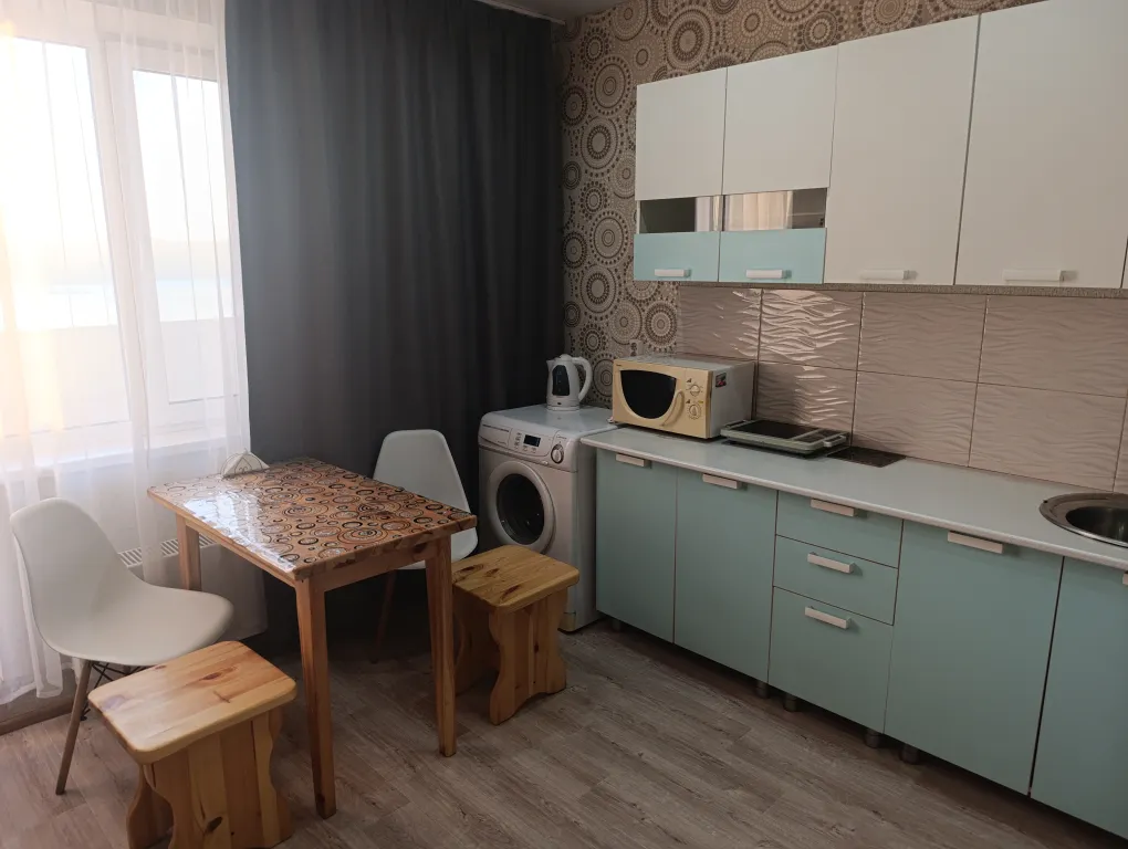 Уютная студия с видом на пруд