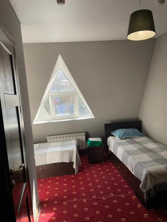 Номер с 2 отдельными кроватями в сердце Домбая