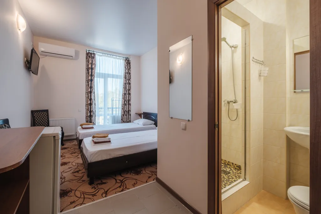 Двухместный номер категории Стандарт с раздельными кроватями