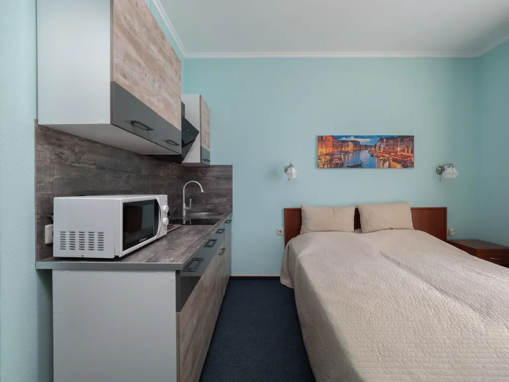 Квартира Квартира Уютная студия у моря с теплым бассейном — Сириус