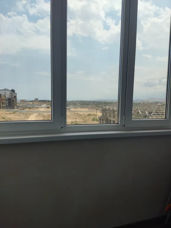 Уютная студия с балконом и видом на море