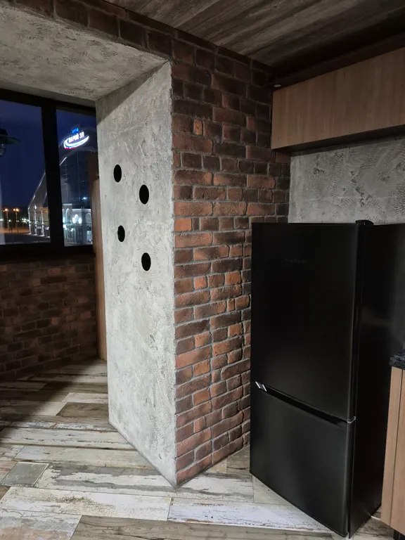 Студия лофт с видом на набережную столицы