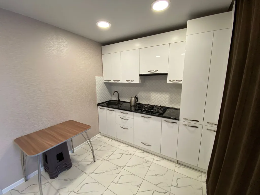 Уютная квартира с современным ремонтом в центре города