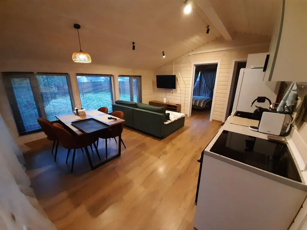 Дом в  соснах.