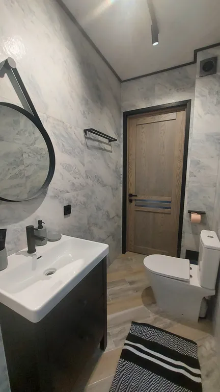 Номер на первом этаже в двухэтажном доме