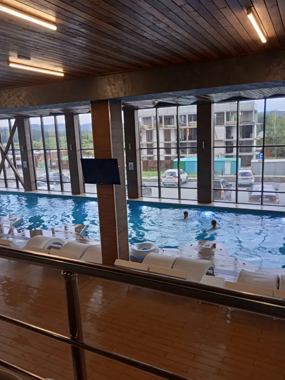 Апартамент с потрясающим видом на горы и песчаный пляж