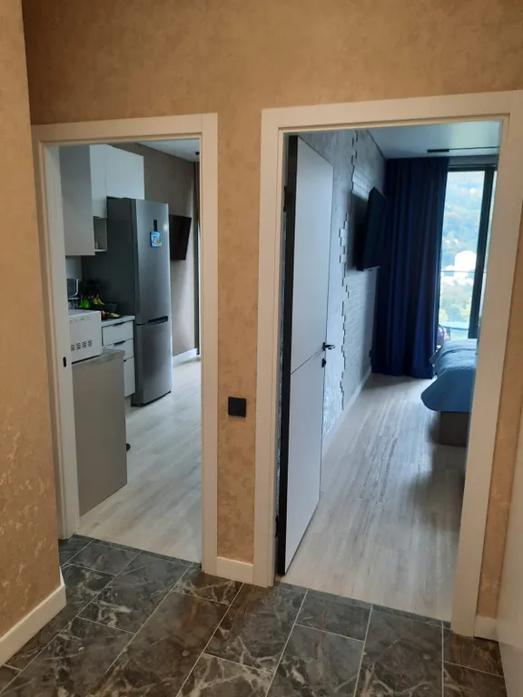 Квартира с балконом и отдельной спальней