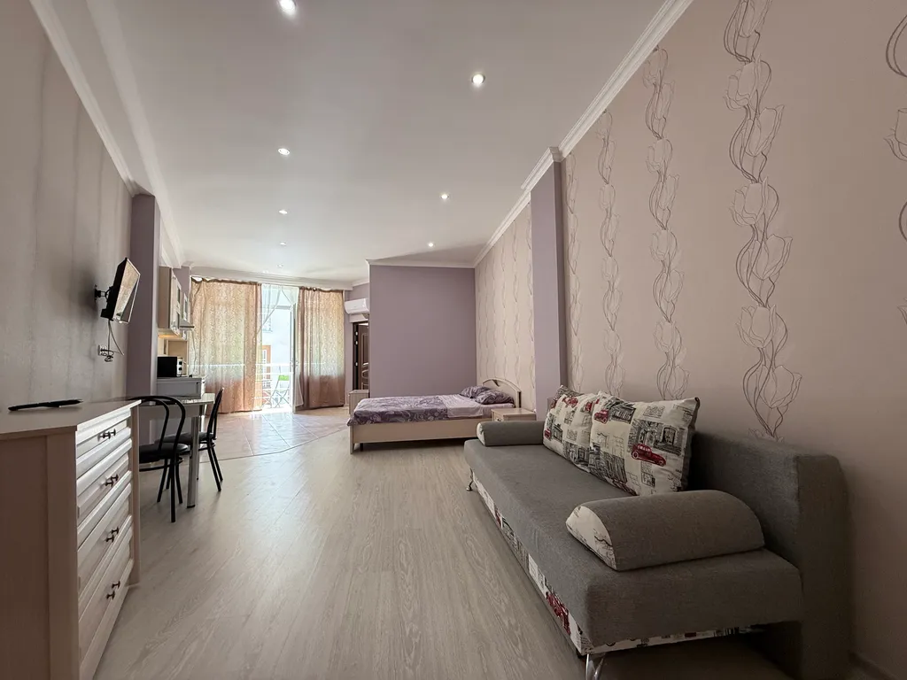 Квартира у пляжа с балконом и зоной барбекю