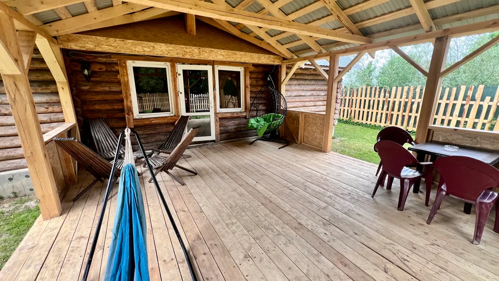 Рубленный дом - баня с террасой