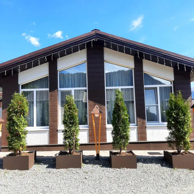 Коттедж Трёхкомнатные апартаменты с видом на горы — Архыз