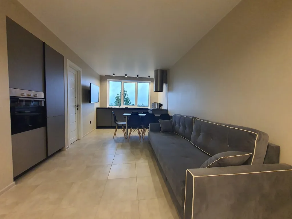 Новый апартамент с гостиной и тремя спальнями