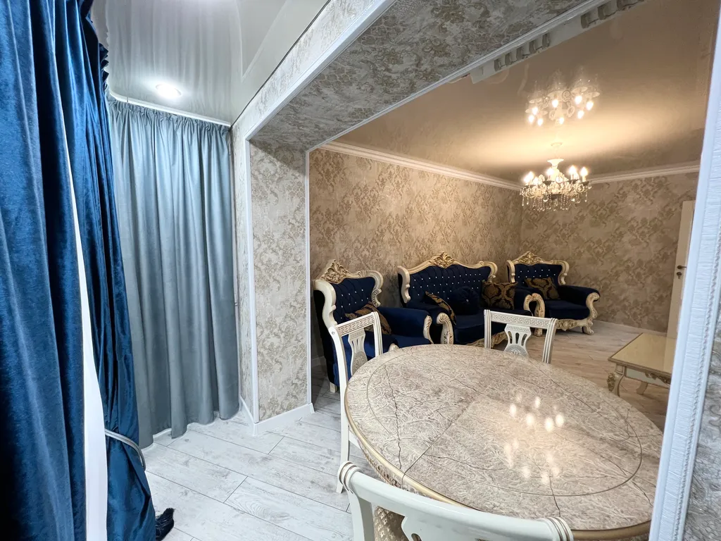 Апартамент с видом на море и на колесо обозрения