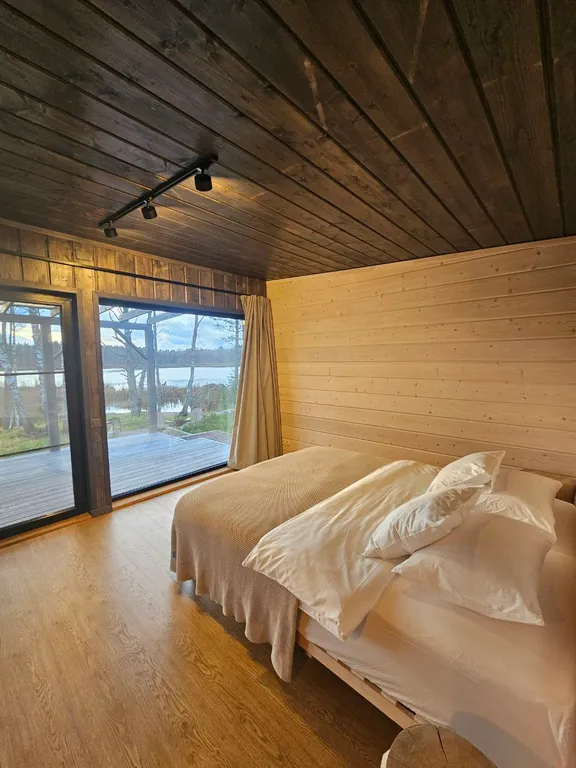 Коттедж Вилла Yksi c видом на озеро и зоной барбекю — Приозерск