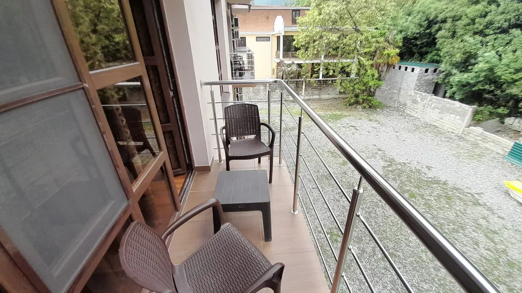 2х местный номер делюкс с кроватью king size, балконом и видом на горы