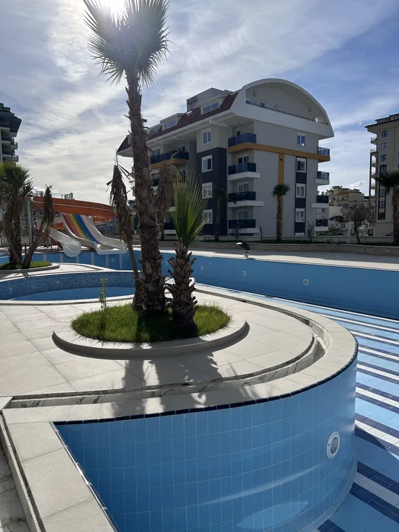 Светлая уютная квартира в Махмутларе с панорамным видом на море и горы