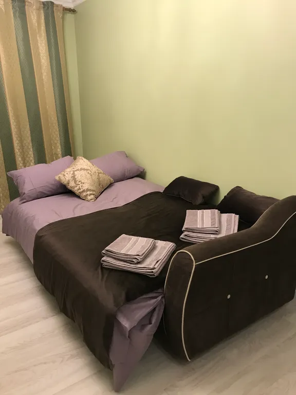 Квартира с зелёной гостиной