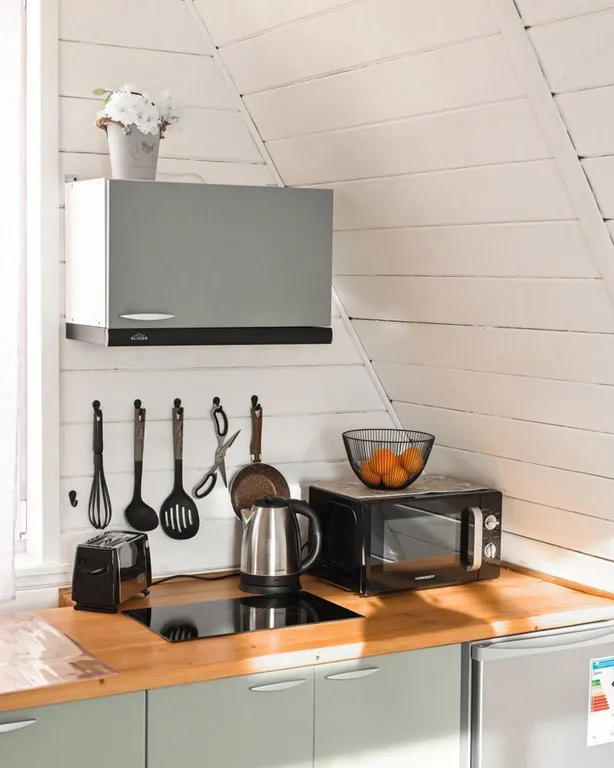 Уютный, современный домик в стиле а-фрейм