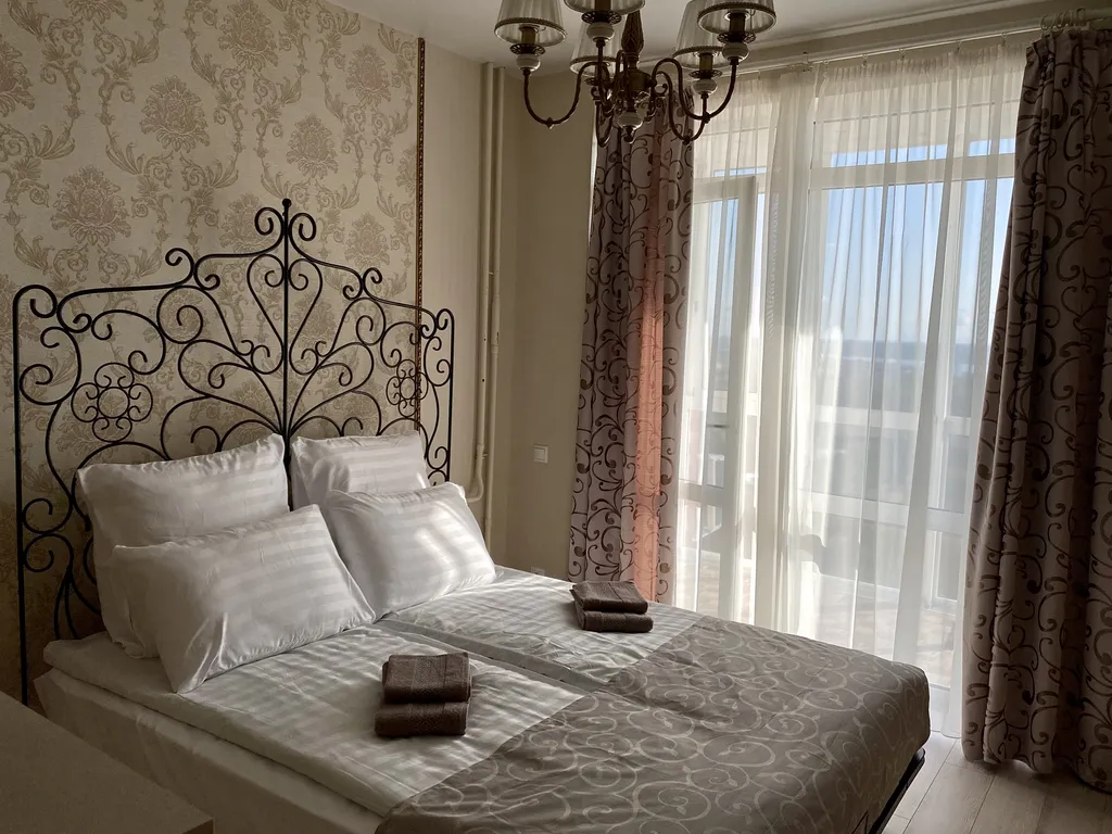 Уютная современная квартира в новом доме с красивым видом на город