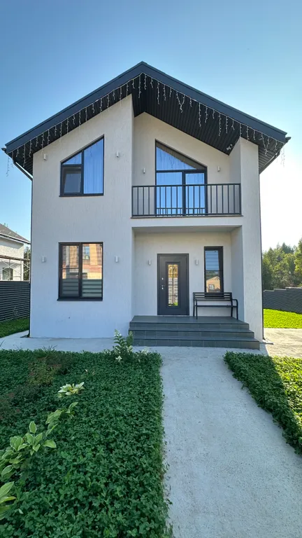 Уютный дом в черте города