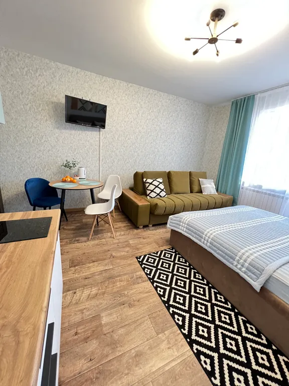 Студия на высоком этаже в новом доме