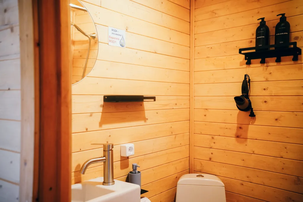 Уютный домик в лесу с террасой и беседкой