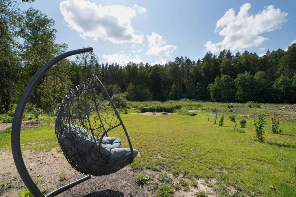 Загородный дом на берегу реки со своим пляжем