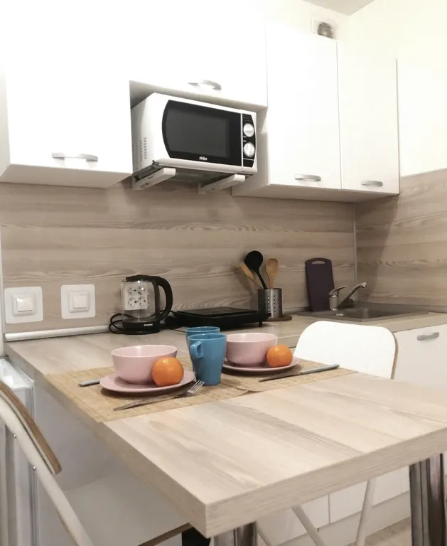 Уютная студия с большой кроватью