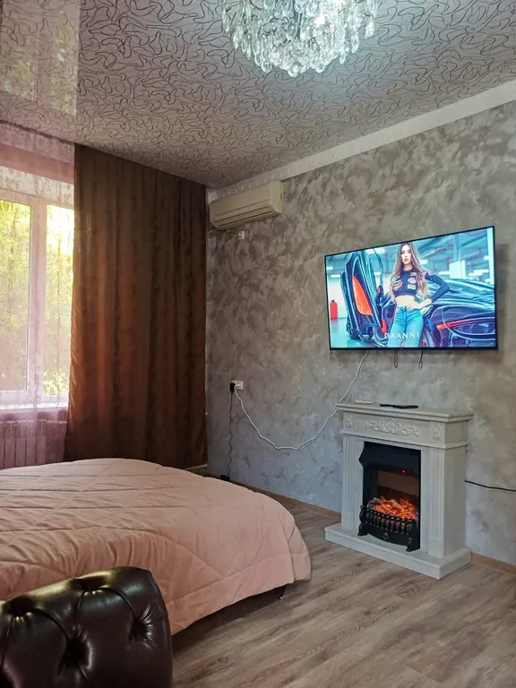 Уютная квартирка в центре города с камином