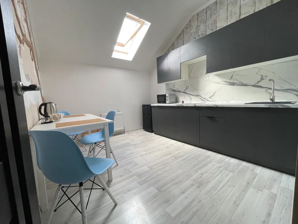 Уютная квартира с мансардными окнами