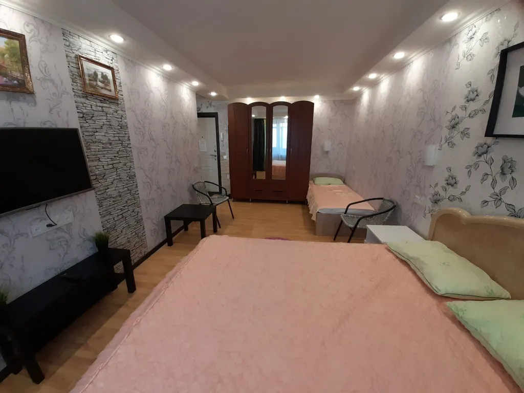 Квартира с балконом и видом на город