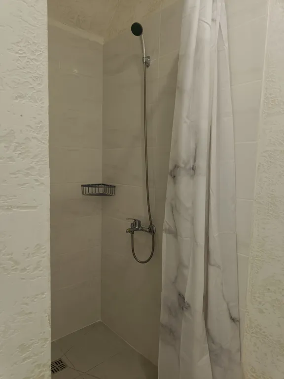 Новая студия в центре с видом на море