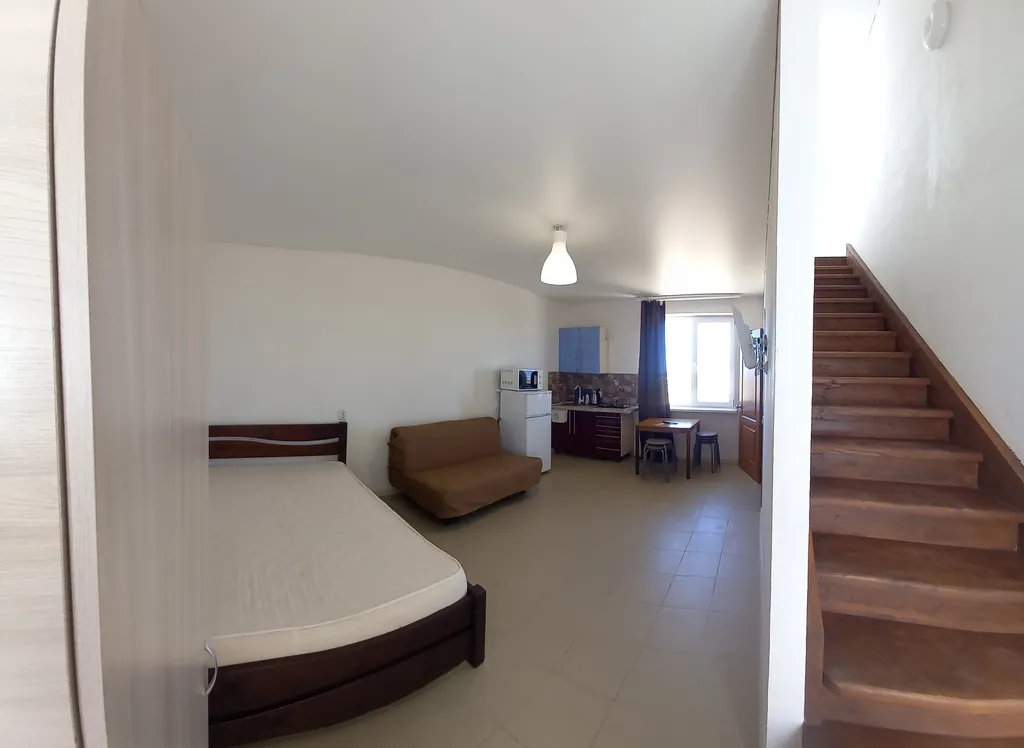 Двухуровневый номер с видом на море