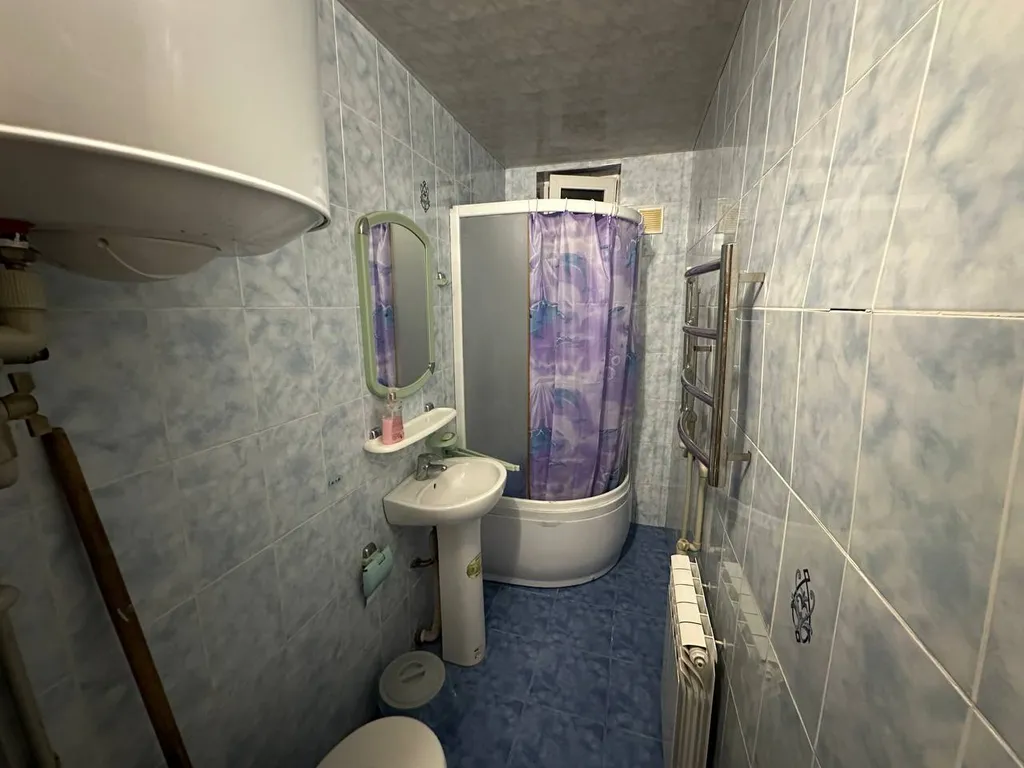 Небольшой гостевой дом со встроенной кухней на берегу моря