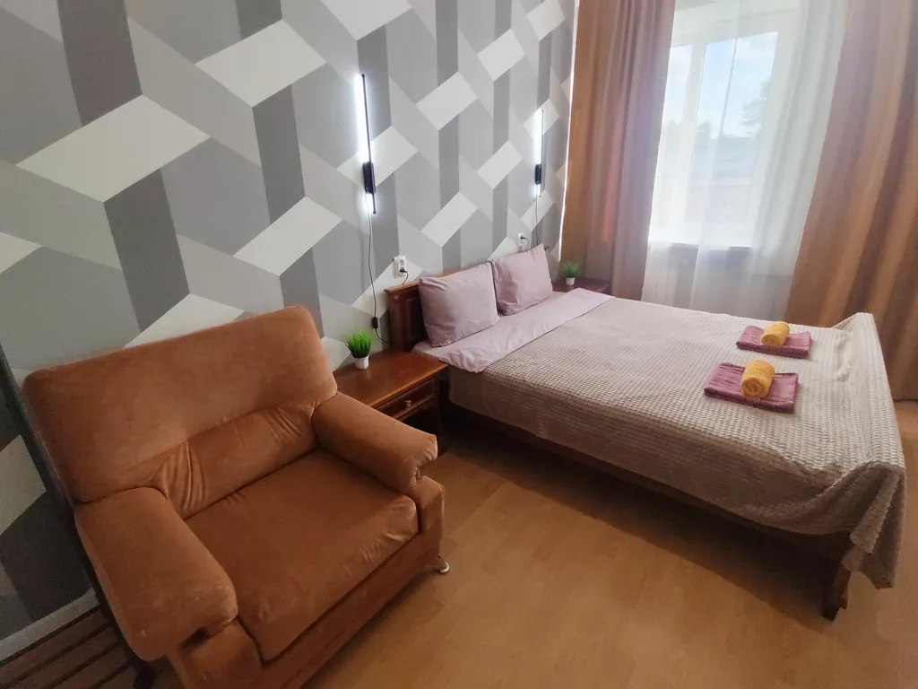 Трёхкомнатная квартира с раздельными комнатами, балконом в центре