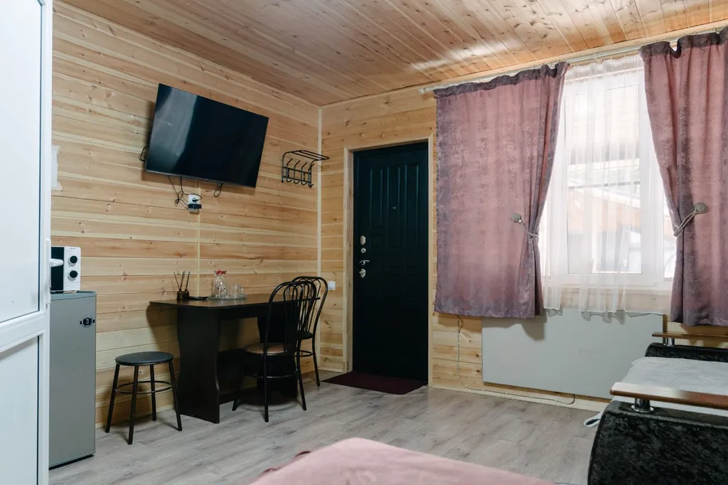 Домик номерного типа с общей террасой