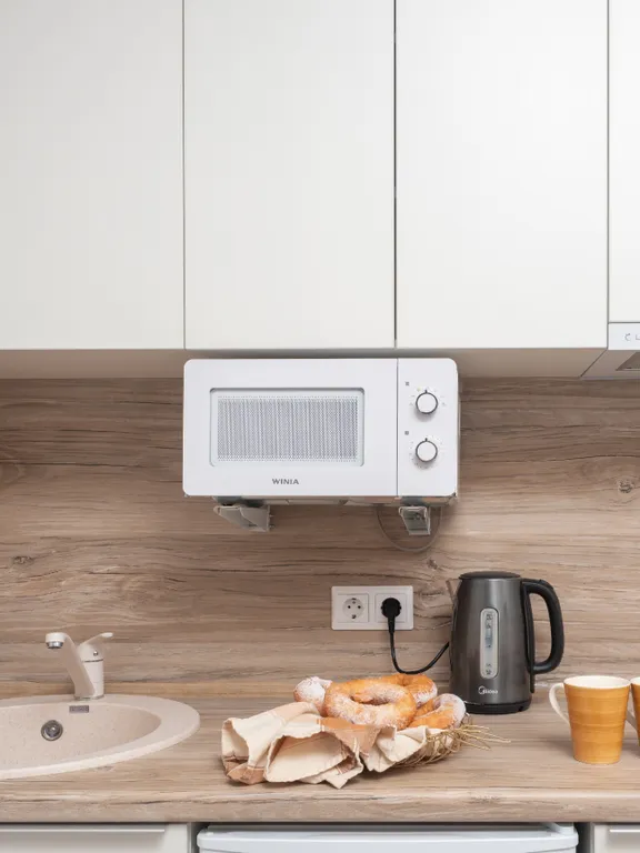 Студия в серо-синих тонах на тихой улочке