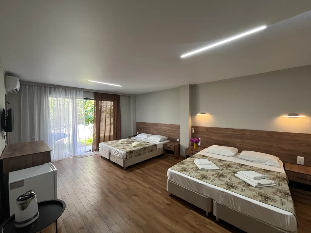 Квартира Гостевой дом У Химы номер комфорт четырехместный — аренда посуточно в Новый Афон