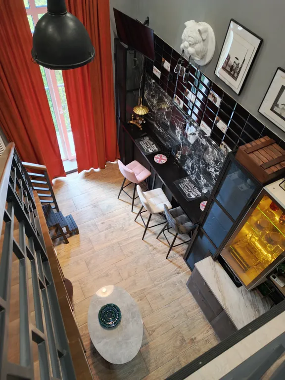 Атмосферная двухуровневая квартира с видом на Петропавловский парк