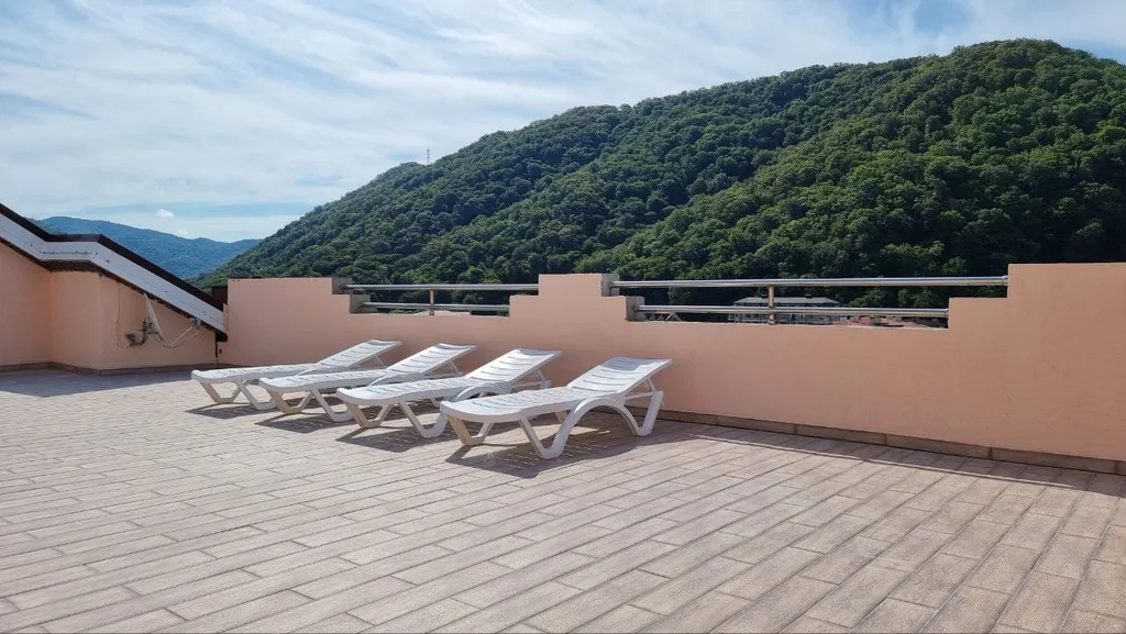 Таунхаус с панорамной эксплуатируемой крышей