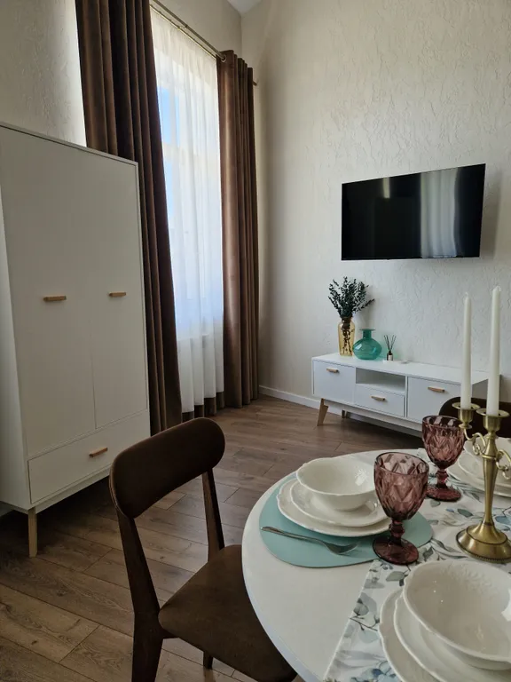 Уютная двухуровневая студия в центре