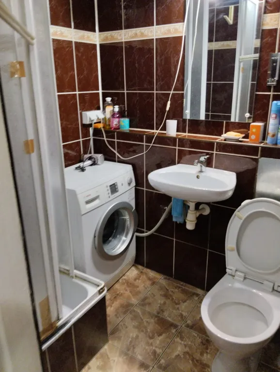 Скромная квартира с изолированными комнатами в центре