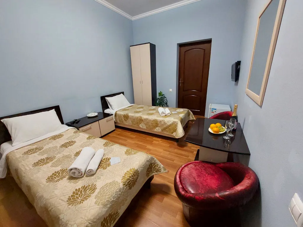 Двухместный номер с раздельными кроватями и балконом