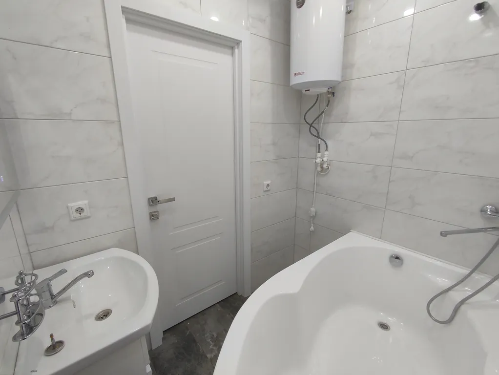 Квартира в новом доме рядом с РКБ и Казань Экспо, аэропорт с парковкой