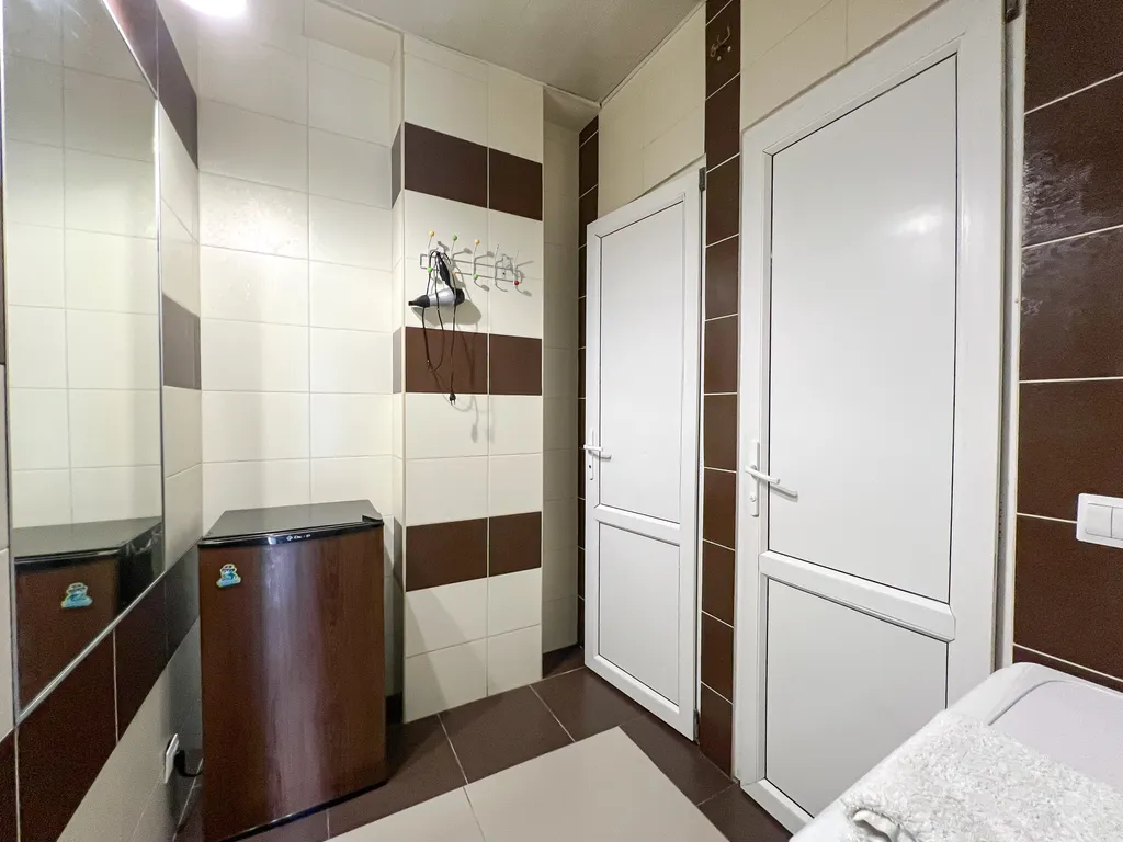 Семейный номер с кухней в центре