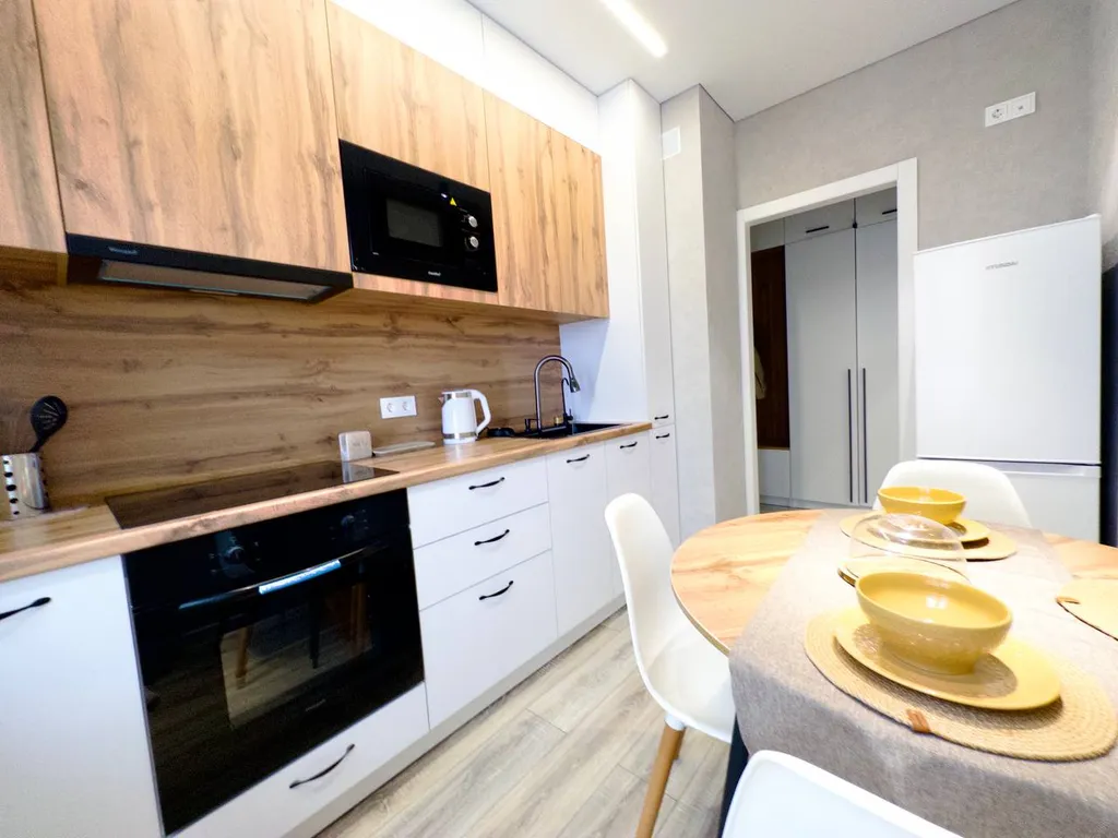 Уютная квартира с большим ТВ