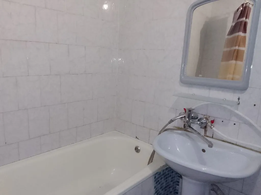 Просторная квартира с видом на горы в посëлке Домбай.