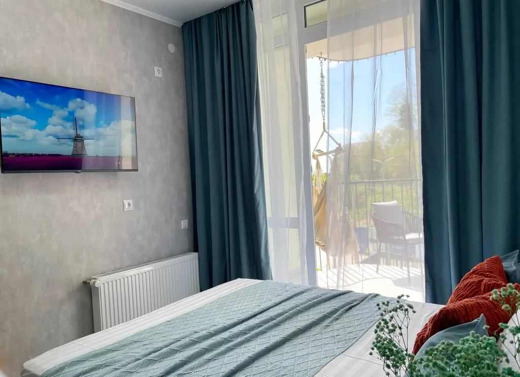 Апартаменты для двоих с большим балконом